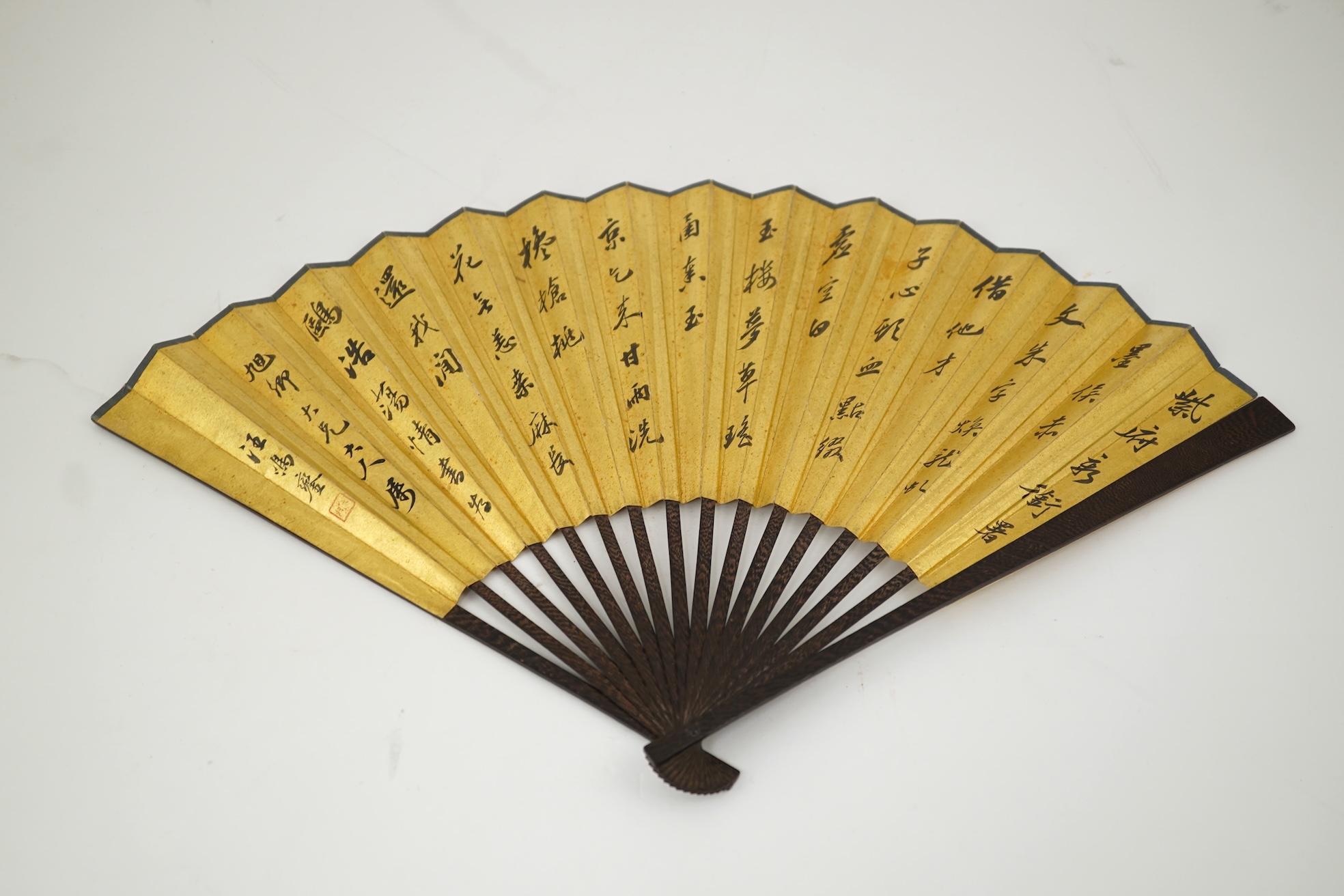 Two Chinese inscribed paper leaf fans, late 19th century